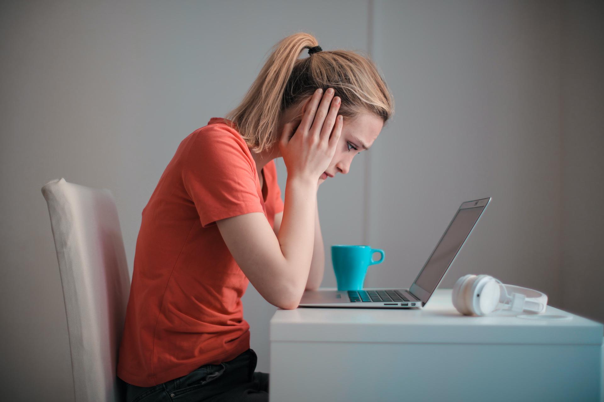 A woman staring at the computer