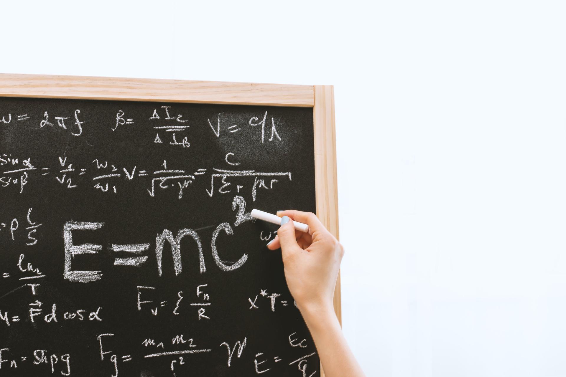 Math Formula Written on Bond Paper